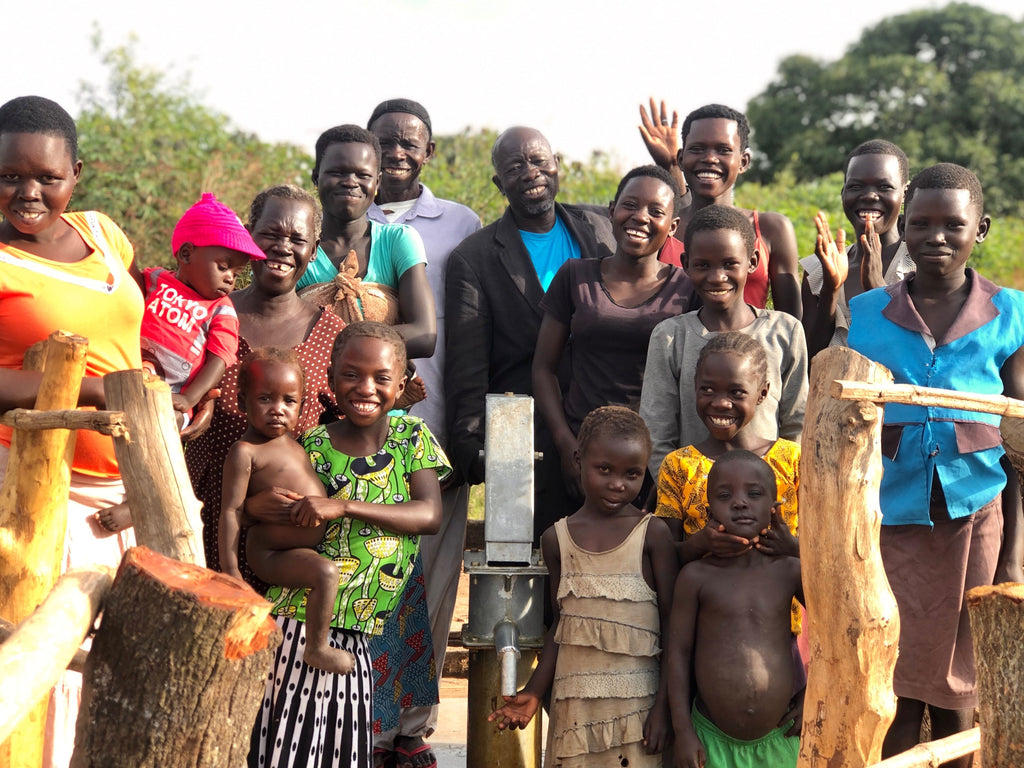 neverthirst - Cecelia and village with new clean water well