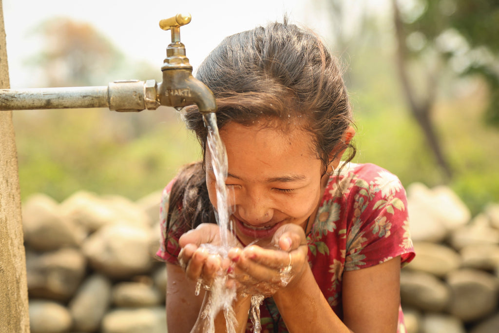 neverthirst - Chari's daughter drinking from tapstand